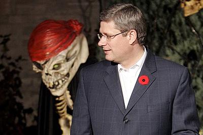 The Prime Minister conspiring with one of his unworldly minions.  ©2006 Conservative Party of Canada.
